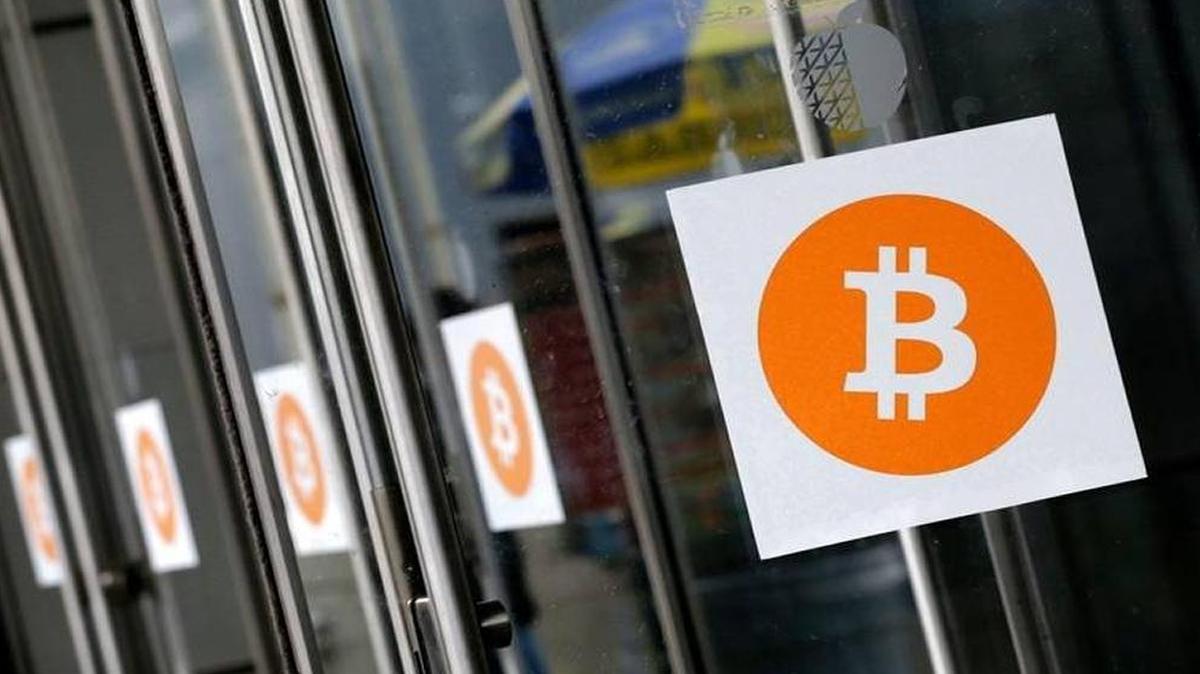 Bitcoins are gaining respectability as a digital currency, leading to massive price speculation. Here logos are displayed at the Inside Bitcoins conference and trade show in New York.