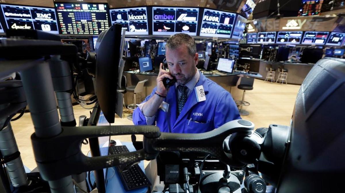 
Trader Kevin Lodewick works on the floor of the New York Stock Exchange before the opening bell, Monday, Aug. 24, 2015. World stock markets plunged on Monday after China's main index sank 8.5 percent amid deepening fears over the health of the world's second-largest economy. 
