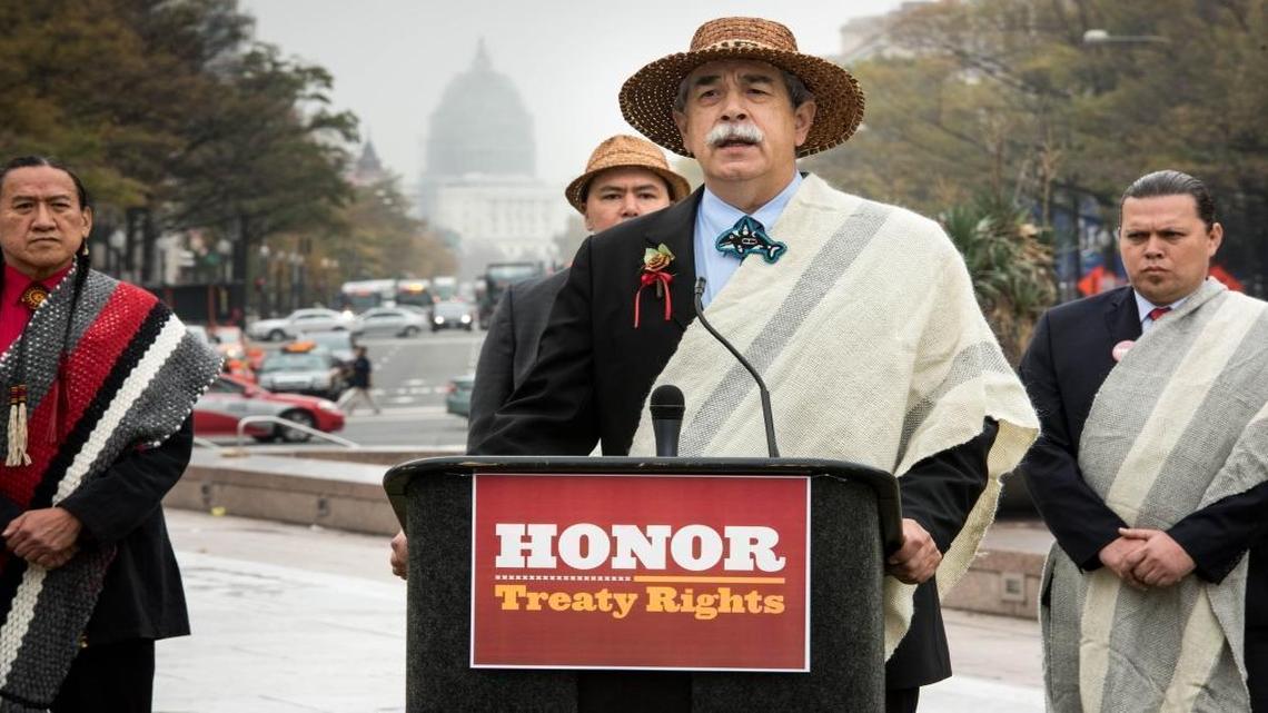 Mel Sheldon, chairman of Tulalip tribes, speaks as he and other tribal leaders gather at a rally while visiting Washington for the White House Tribal Nations Conference to urge Congress to uphold treaty rights and reject permits for a shipping terminal in Lummi's fishing waters. The rally took place at Freedom Plaza in Washington, D.C., Nov. 5, 2015. As Lummi Nation fights to protect its fishing areas from North America's largest coal terminal, other tribes have faced their own development pressures and stand united with Lummi against the terminal and what they say is the erosion of treaty rights.