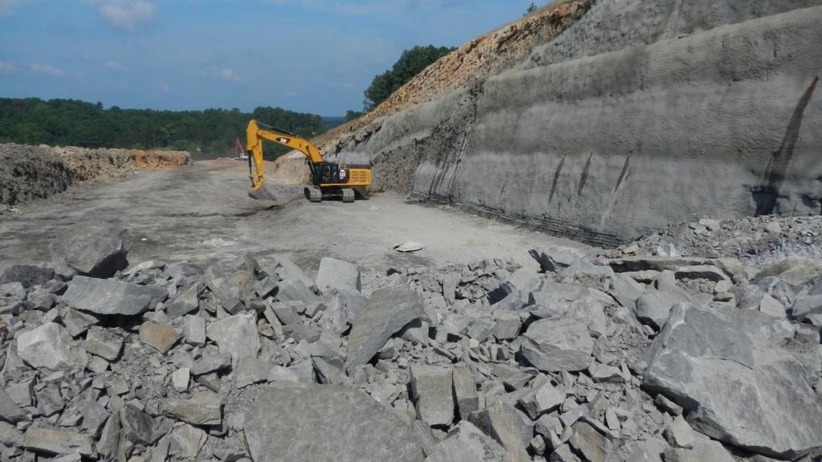 Construction is under way on the Birmingham Northern Beltline near Palmerdale, Ala., on July 21, 2015. Democratic presidential candidate Hillary Clinton has proposed to finish the controversial highway as part of a larger program to lift economically struggling communities. The 52-mile road is estimated to cost $5.4 billion.