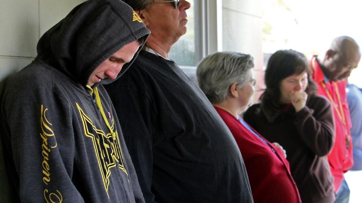 Low-income residents line up outside of Bethel Free Health Clinic in Biloxi, Mississippi, to see a doctor on March 19, 2013. In a new study, Mississippi ranks last among states in providing economic opportunities for residents.