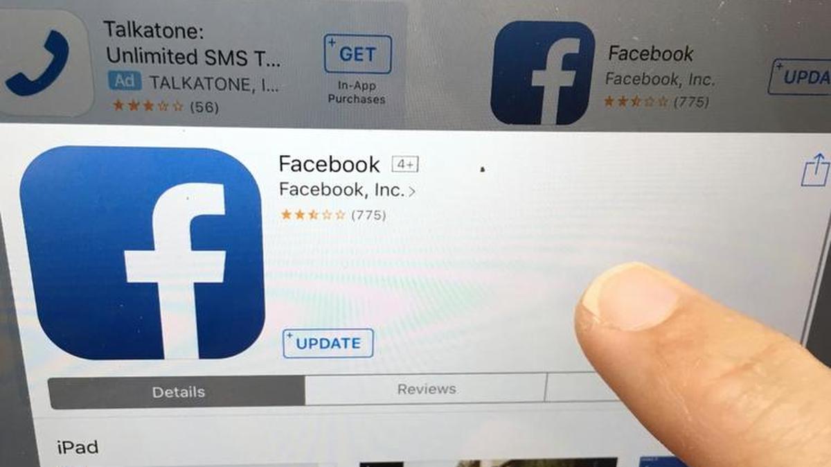 A user updates Facebook on an iPad. Several people with tight connections to Facebook, some as early investors, some as former officials, are going public with a critique of the company and social media more broadly.