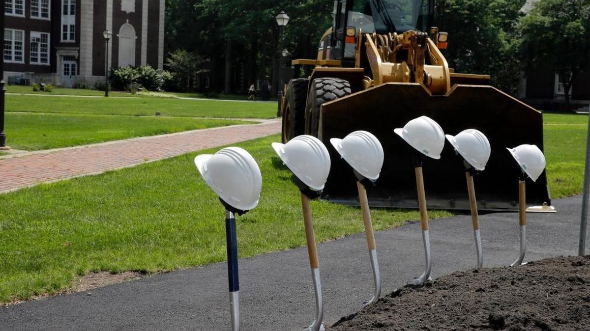 
White hard hats have been placed on shovels at The College of New Jersey for a groundbreaking ceremony for the school's planned $75 million science, technology, engineering and mathematics complex Tuesday, July 7, 2015, in Ewing, N.J. 
