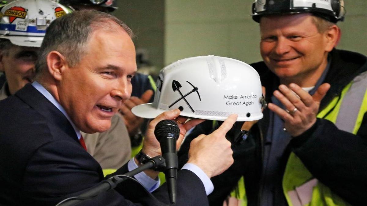 U.S. Environmental Protection Agency Administrator Scott Pruitt holds up a hard hat he received during a visit to Consol Pennsylvania Coal Co.’s Harvey Mine in Sycamore, Pa., April 13, 2017. Kentucky has lost its No. 3 spot in coal production to Pennsylvania.