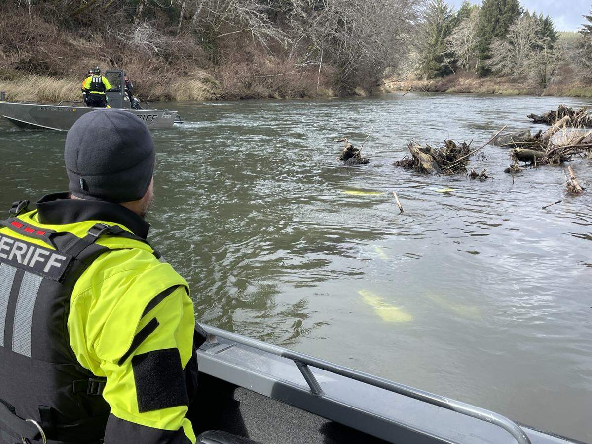 Search teams look for Dane in the Siletz River.