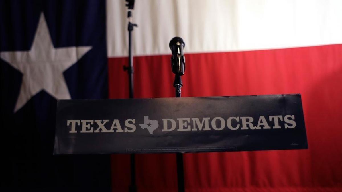 A Texas Democrats sign hangs on a podium at a Democratic watch party following the Texas primary election last week.