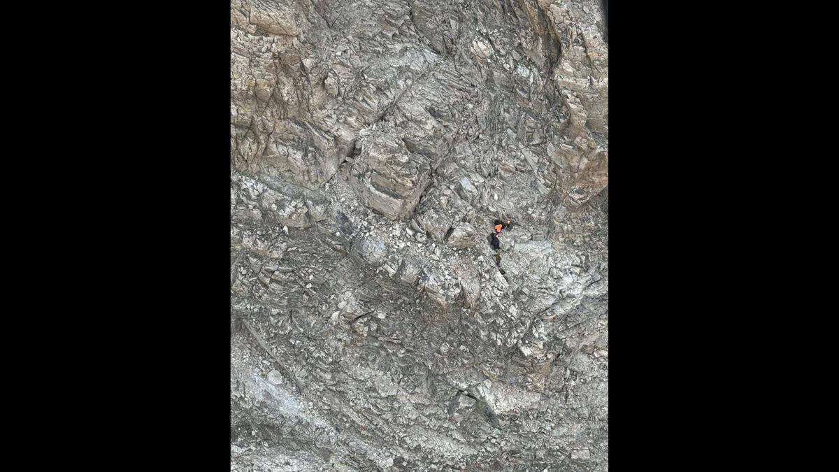 This photo shows the rocky and jagged terrain where the injured climber was trapped.
