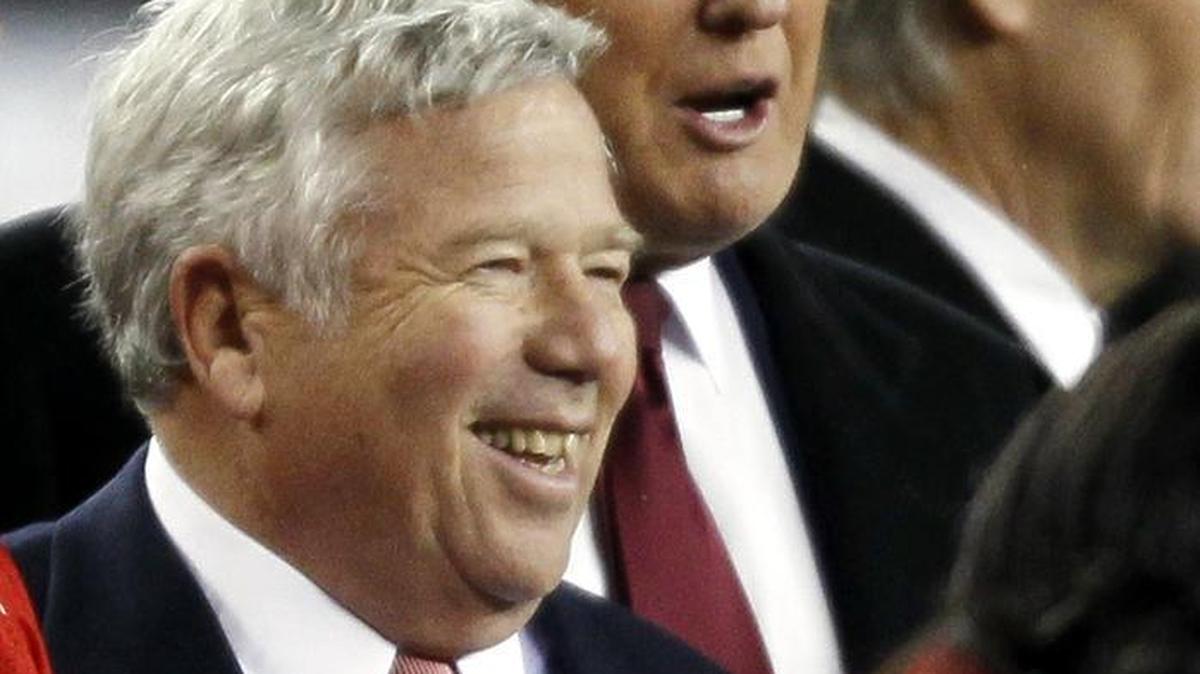 New England Patriots owner Robert Kraft stands on the sidelines with Donald Trump prior to a NFL football game between the New England Patriots and the New York Jets at Gillette Stadium in Foxborough, Mass. Monday, Dec. 6, 2010.