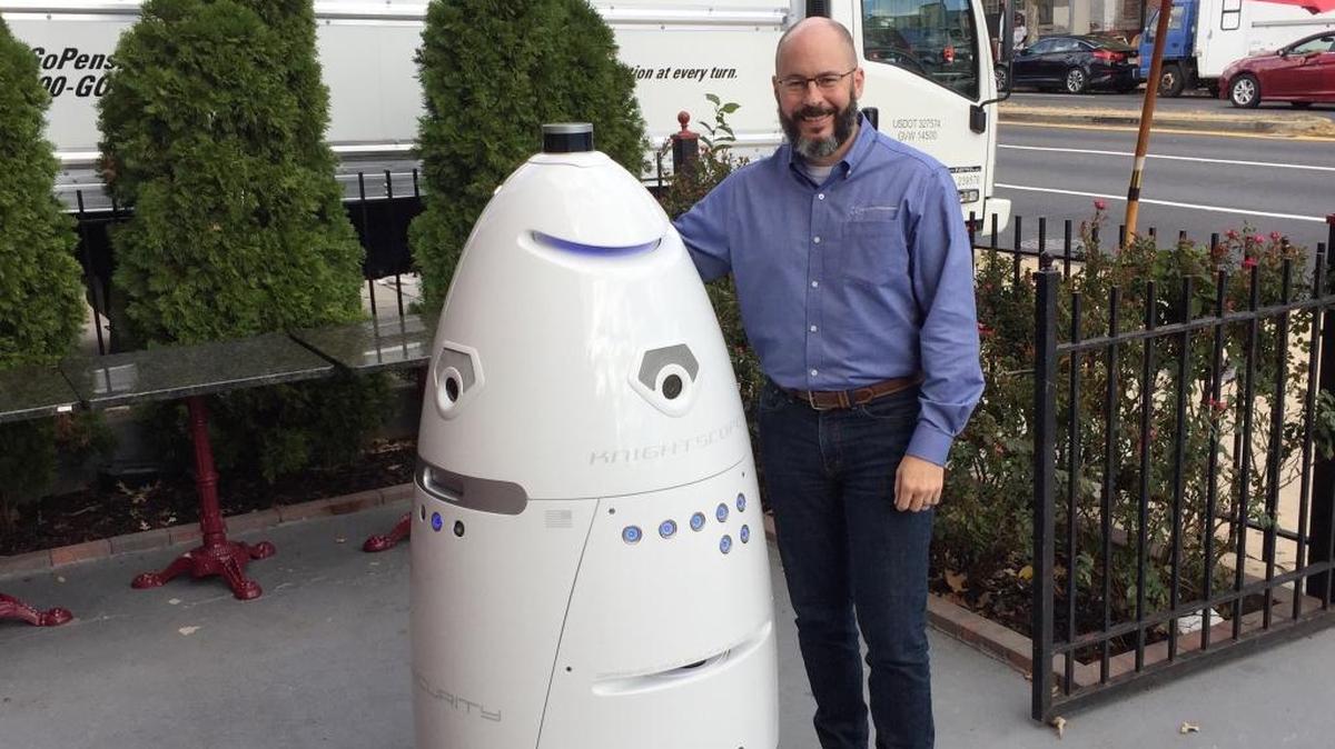 Stacy Dean Stephens, cofounder of the start-up Knightscope, shows off K5, one of the Mountain View, California, company’s autonomous self-propelled robots. The K5 robot is designed for outdoor use, and can do video and thermal imaging, read license plates, detect humans in areas that are off limits, and emit escalating alarms if attacked.