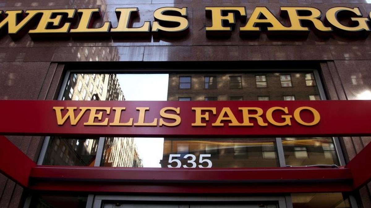 A Wells Fargo sign is displayed at a branch in New York in this May 2012 file photo.