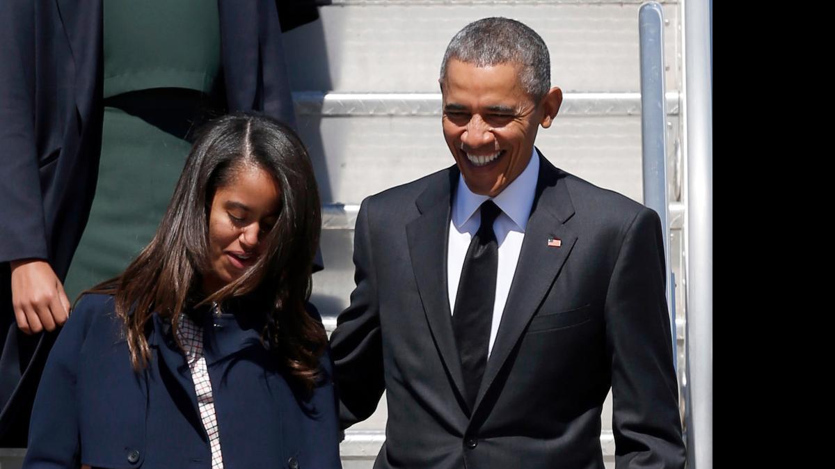 
In this March 7, 2015 file photo, President Barack Obama and Malia Obama arrive at Air Force One at Maxwell Air Force Base in Montgomery, Ala. 
