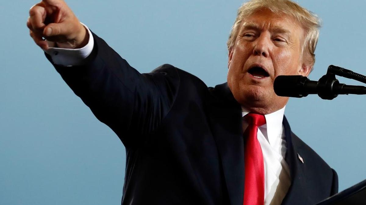 In this Oct. 11, 2017, photo, President Donald Trump speaks about tax reform during an event at the Harrisburg International Airport in Middletown, Pa. A GOP-aligned group is going up with a new ad buy to push Republicans to get tax reform done.