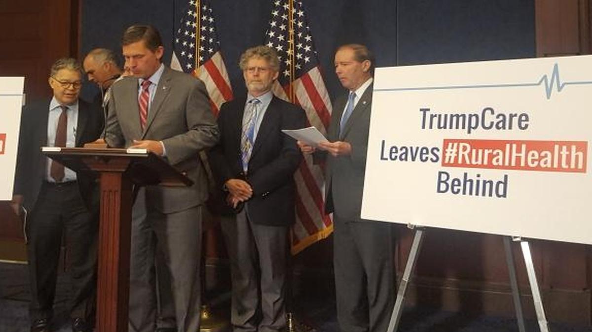 Democratic senators including Sen. Martin Heinrich of New Mexico, at the microphone, at a news conference Wednesday, May 24, 2017, about the impacts on rural health care of the Republican American Health Care Act. Sen. Bob Casey of Pennsylvania is shown to Heinrich’s immediate right.