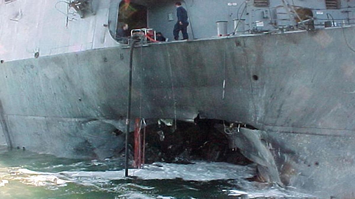 The U.S. Navy released this view of damage sustained on the port side of the Arleigh Burke-class guided missile destroyer USS Cole after a suspected terrorist bomb exploded during a refueling operation in the port of Aden, Yemen, Oct. 12, 2000.