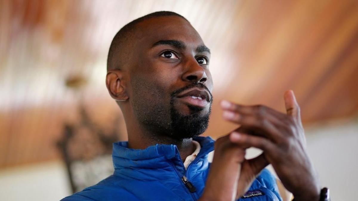 Baltimore mayoral candidate DeRay Mckesson chats with campaign volunteers before canvassing in Baltimore last year.
