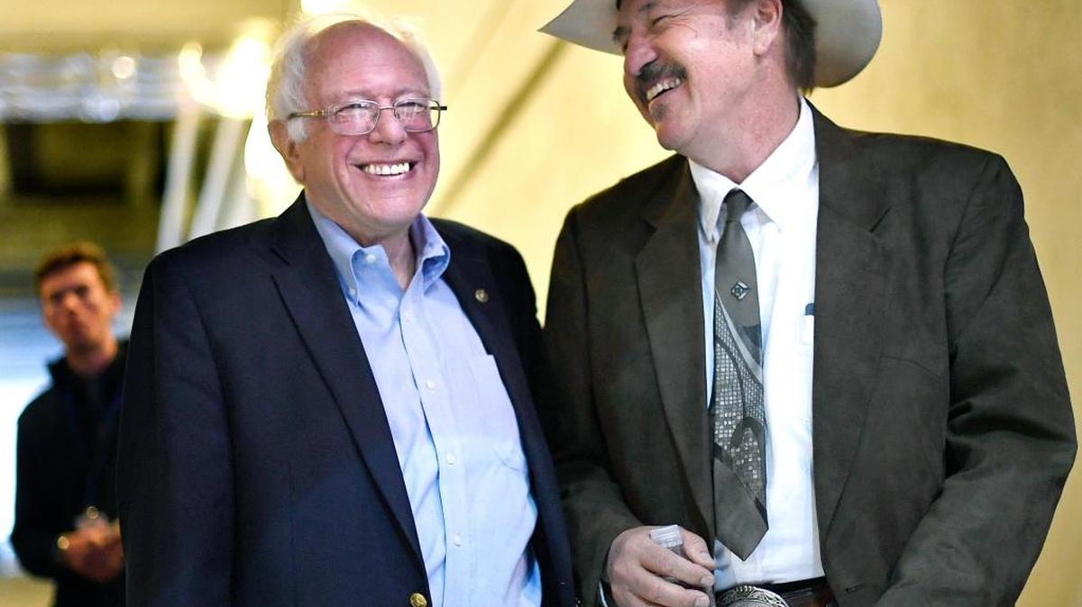 Sen. Bernie Sanders, left, and Rob Quist share a laugh backstage.