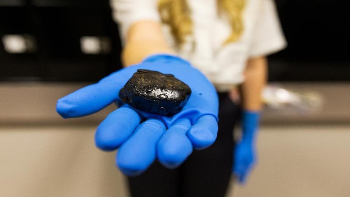In this Jan. 27, 2016 photo, Post Falls, Idaho Police display a 40-gram chunk of black tar heroin with a street value of about $12,000. Republican Senate negotiators are considering $45 billion over ten years to fight heroin and opioid addiction. Health experts say more money is needed. (Shawn Gust /Coeur D'Alene Press via AP) MANDATORY CREDIT