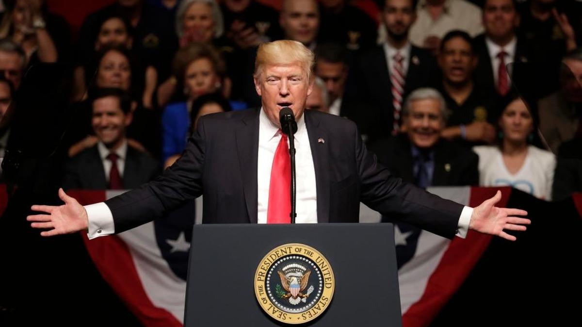 President Donald Trump speaks as he announces a revised Cuba policy aimed at stopping the flow of U.S. cash to the country's military and security services while maintaining diplomatic relations, Friday, June 16, 2017, in Miami.