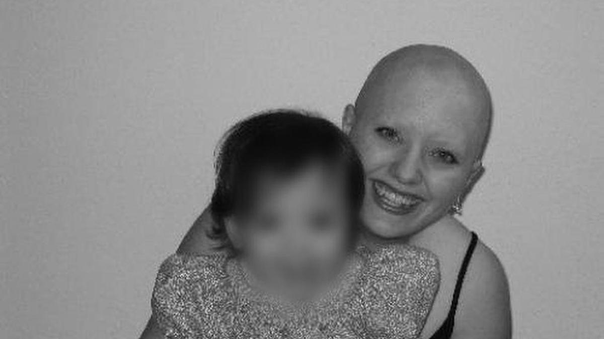 Hope with her youngest daughter. She would later be accused of causing serious bodily injury to the girl.