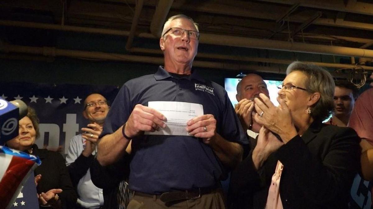 Two political action committees spent more than $400,000 in October on television ads aimed at boosting Republican state Senate candidate Mike Cierpiot and attacking his Democratic opponent. Tuesday night, Cierpiot (center) spoke to supporters after winning election.