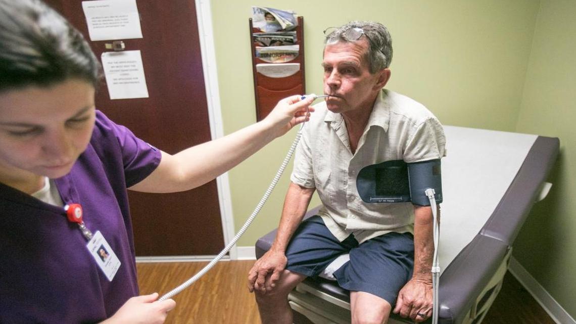 Terry Brewster, a construction worker, visits his primary care physician, Dr. Paul Cohen, at Little River Medical Center in Little River, South Carolina. Brewster, dealing with high blood pressure and arthritis, is concerned that if he loses his Affordable Care Act subsidies, he will no longer be able to afford medical treatment.