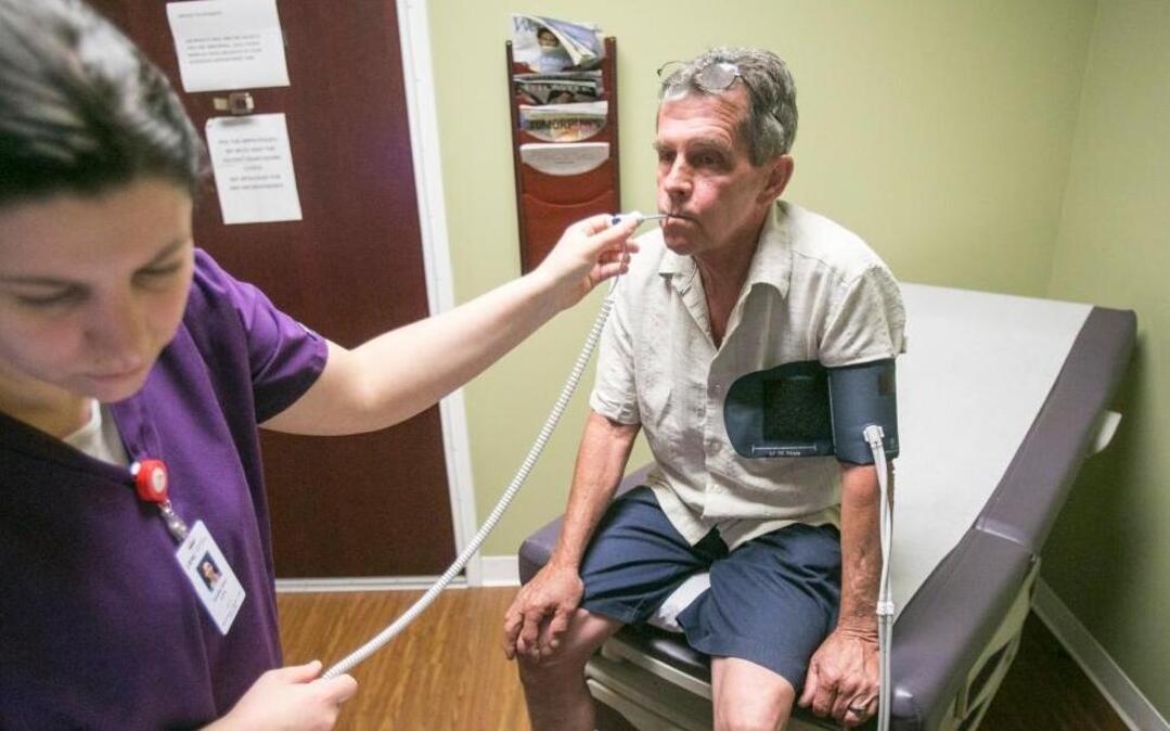 Terry Brewster, a construction worker, visits his primary care physician, Dr. Paul Cohen, at Little River Medical Center in Little River, South Carolina. Brewster, dealing with high blood pressure and arthritis, is concerned that if he loses his Affordable Care Act subsidies, he will no longer be able to afford medical treatment.