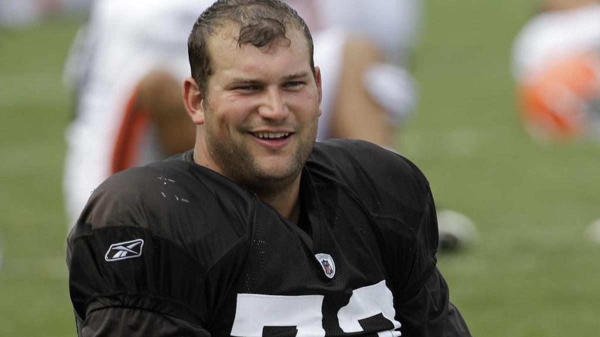 Cleveland Browns offensive tackle Joe Thomas stretches during practice at the NFL football team's training camp in Berea, Ohio. Thomas said in an interview released Wednesday that he already suffers memory loss after 11 years in professional football.