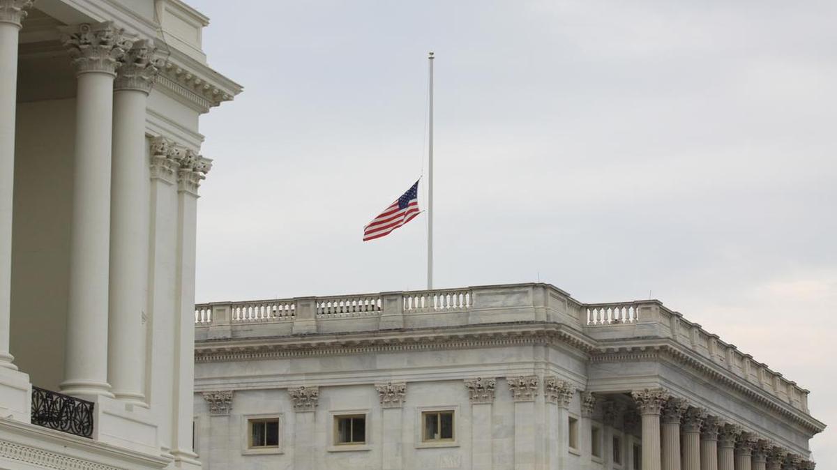 
The flag is seen at half-staff at the U.S. Capitol on Tuesday, July 21, 2015, in Washington. The flags at the U.S. Capitol were lowered to half-staff to honor the five service members killed in Chattanooga, Tenn., last week.
