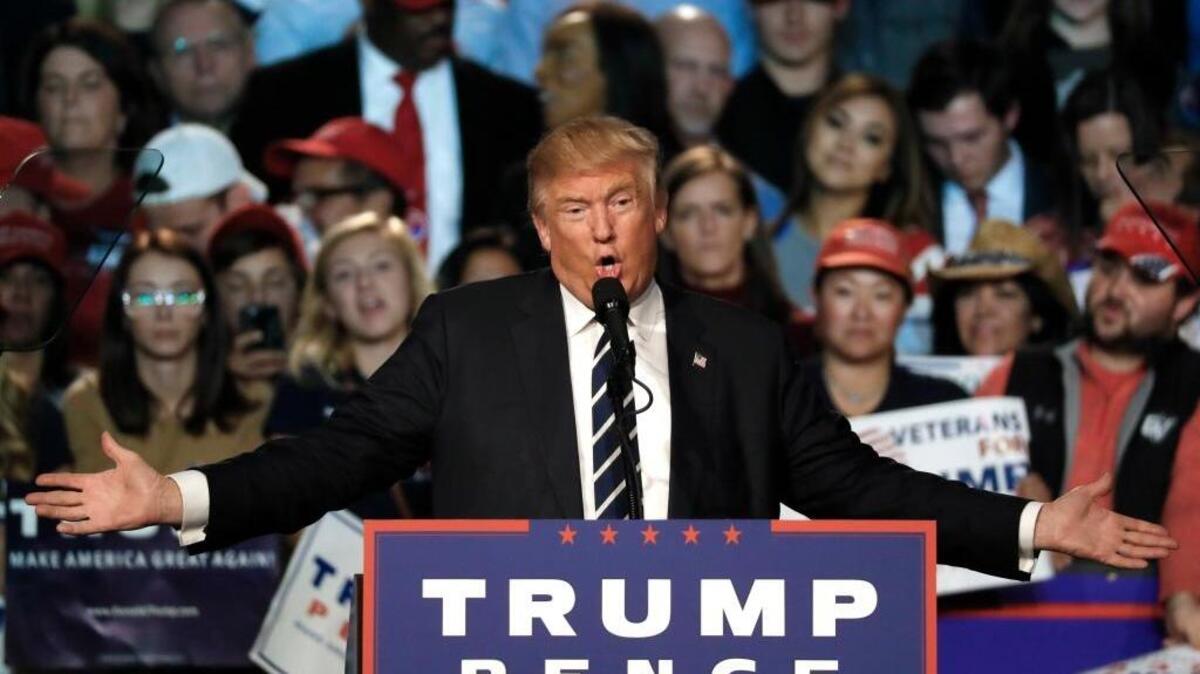 In this Election Day photo, Republican presidential candidate Donald Trump speaks at a campaign rally in Grand Rapids, Mich.