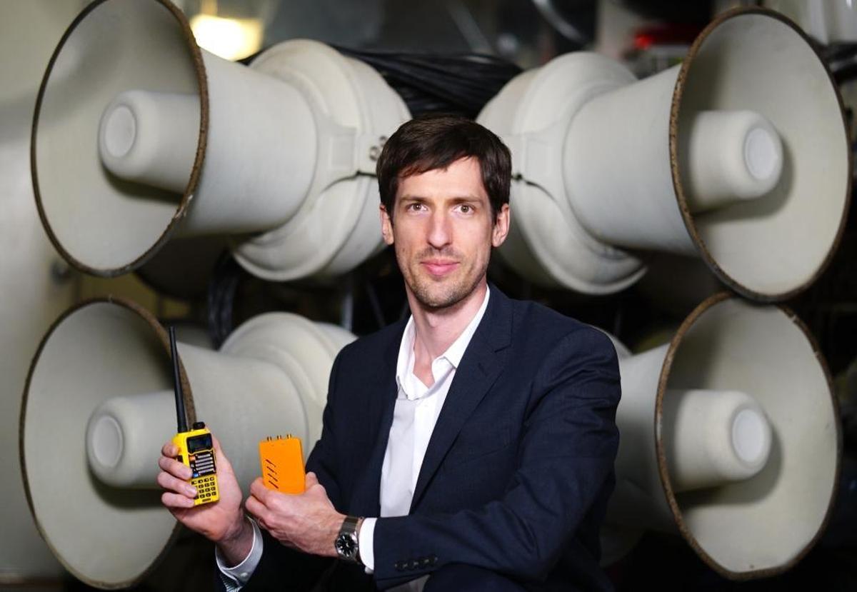 Balint Seeber, a vulnerability researcher at Bastille, a San Francisco-based security firm, holds the inexpensive radio gear he used to find a way to penetrate the city’s emergency alert system of sirens and loudspeakers.