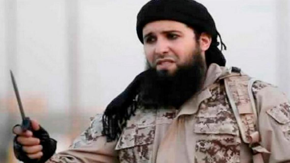 An image grab taken from a video made available by jihadi media outlet Welayat Nineveh on July 20, 2016, allegedly shows Rashid Kassim, a French member of the Islamic State group, speaking to the camera before beheading two men along with another jihadi.