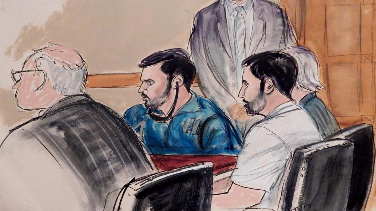 In this courtroom sketch, a U.S. marshal stands guard in the background as defense attorney John Reilly, left, Francisco Flores, center in blue shirt, Efrain Campo, second from right, and defense attorney Rebekah Poston make an initial appearance in Manhattan federal court on Nov. 12, 2015, in New York. An indictment unsealed Thursday accuses Campo and Flores, nephews of Venezuela's first lady, of conspiring to smuggle cocaine into the United States.