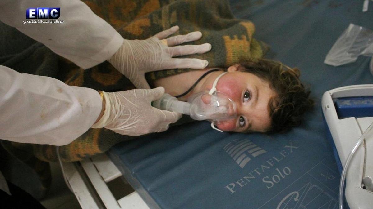 This photo provided Tuesday, April 4, 2017, by the Syrian anti-government activist group Edlib Media Center shows a Syrian doctor treating a child following a suspected chemical attack in Khan Sheikhoun, Syria.