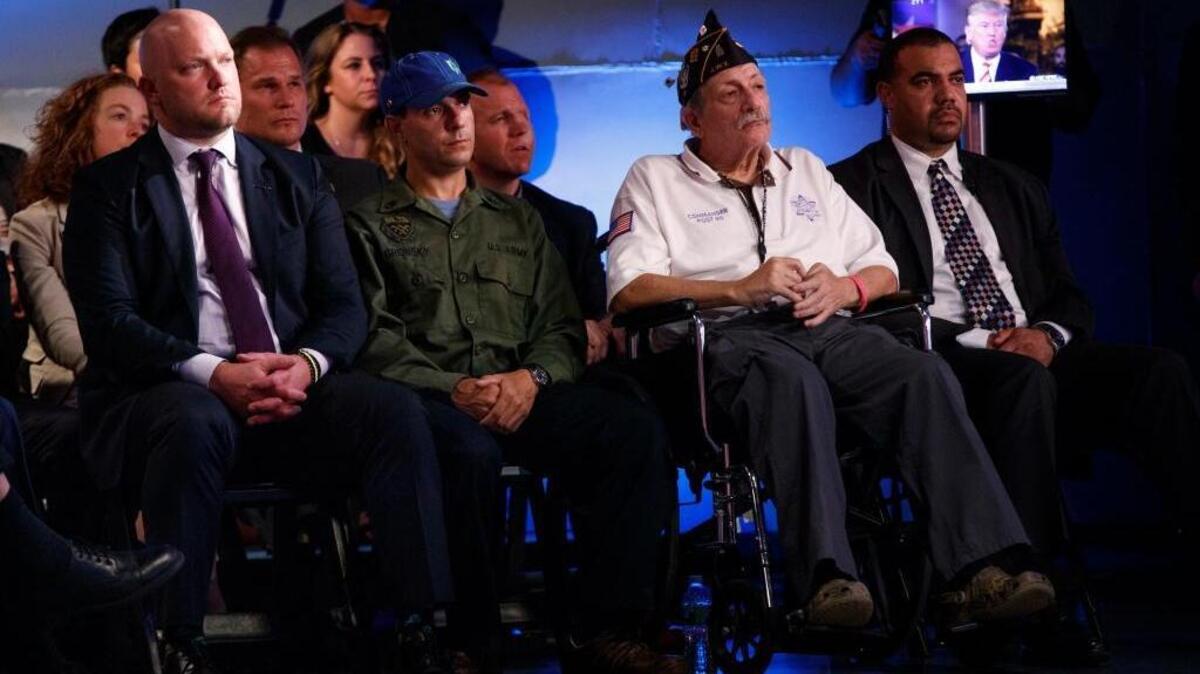 Veterans listening to Donald Trump.