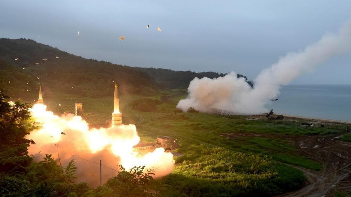 South Korea test fires one of its missiles, left, after the U.S. Army fired one of its missiles, right, during a combined military exercise between the two countries at an undisclosed location in South Korea, July 29, 2017. This exercise was after held North Korea conducted its second flight test this year of an intercontinental ballistic missile, with North Korean leader Kim Jong claiming that the latest one demonstrates his country can hit the U.S. mainland.