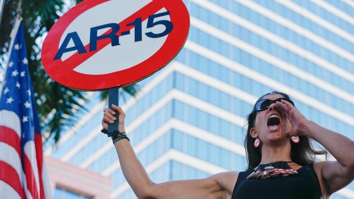 Alessandra Mondolfi yells, "No More" during a protest against guns on the steps of the Broward County Federal courthouse in Fort Lauderdale, Fla., on Feb. 17, 2018.