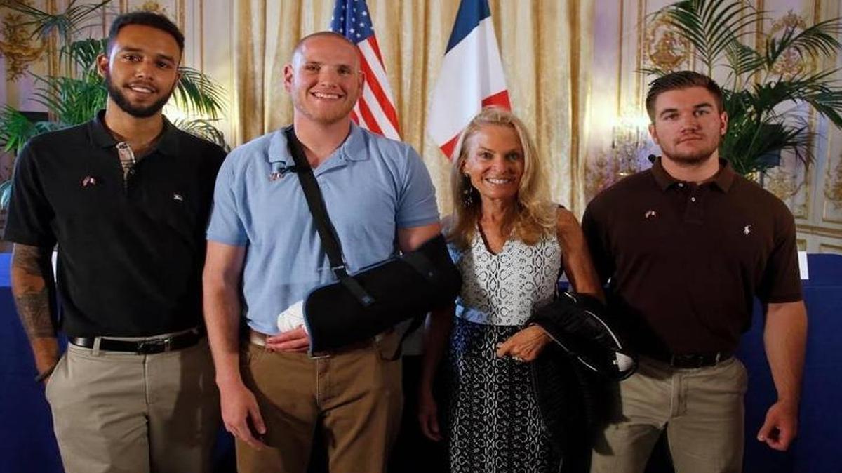 
Airman Spencer Stone’s hand was badly slashed as he struggled with a would-be attacker aboard a high-speed train in France. On Thursday, the Pentagon will award him the Purple Heart. He’s shown here Aug. 23 with U.S. Ambassador to France Jane Hartley and fellow heroes Anthony Sadler and National Guard Spc. Alek Skarlatos.
