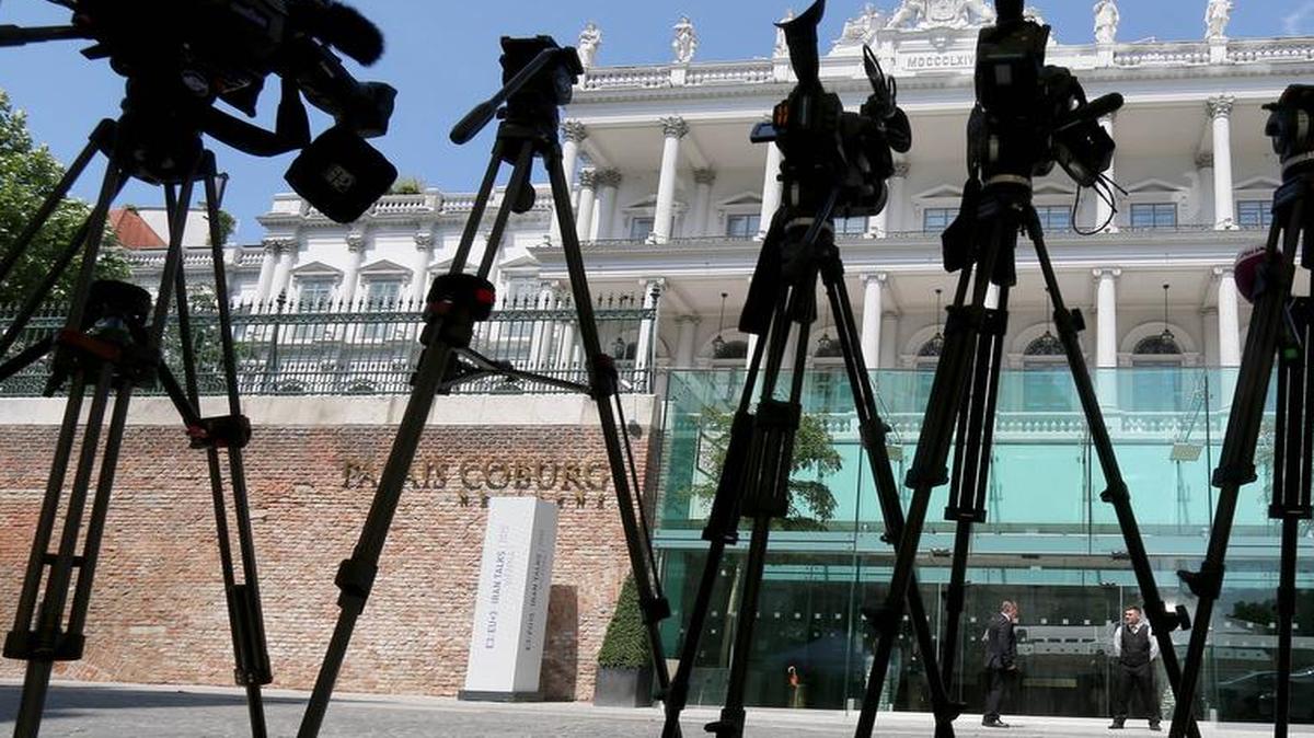 
TV cameras stand in front of Palais Coburg where closed-door nuclear talks with Iran take place in Vienna, Austria, Friday June 26, 2015.
