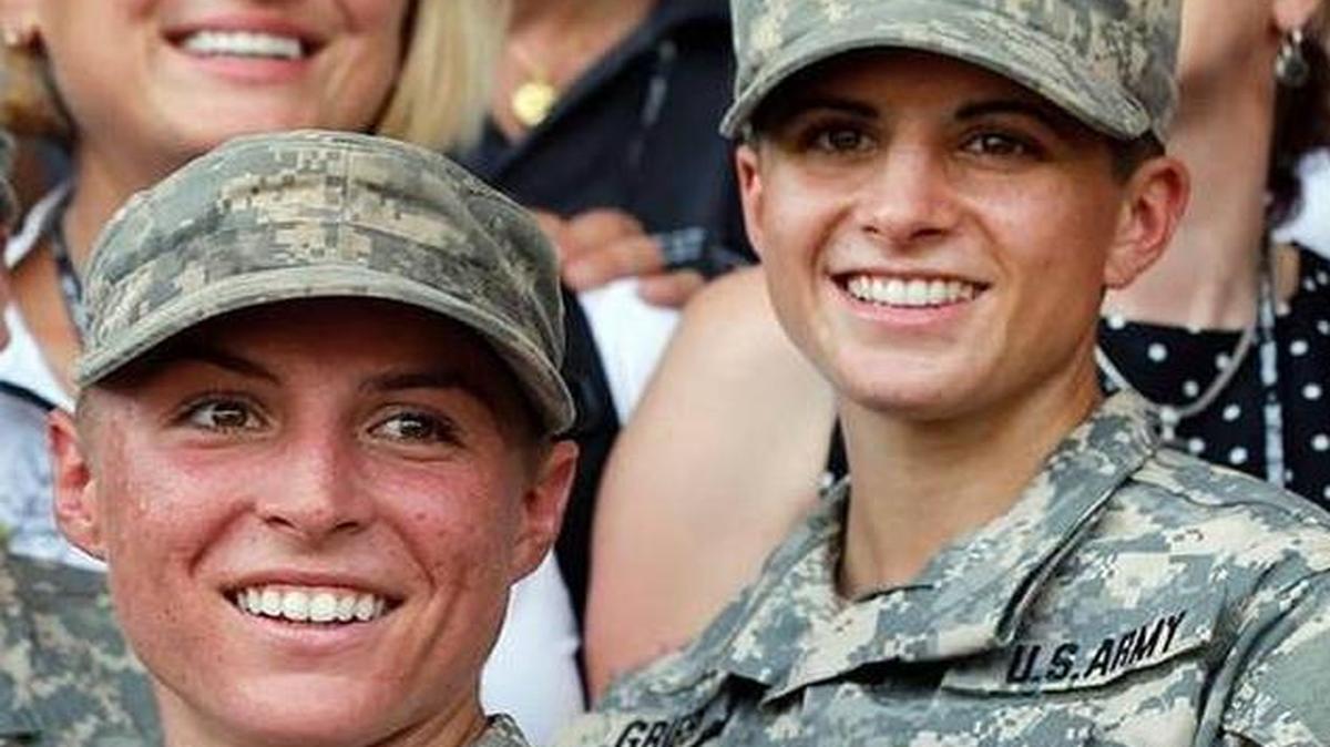 
U.S. Army First Lt. Shaye Haver, front, and Capt. Kristen Griest, right, with other female West Point alumni after an Army Ranger school graduation ceremony, Friday, Aug. 21, 2015, at Fort Benning, Ga. More than 75 women West Point graduates gathered for the ceremony.
