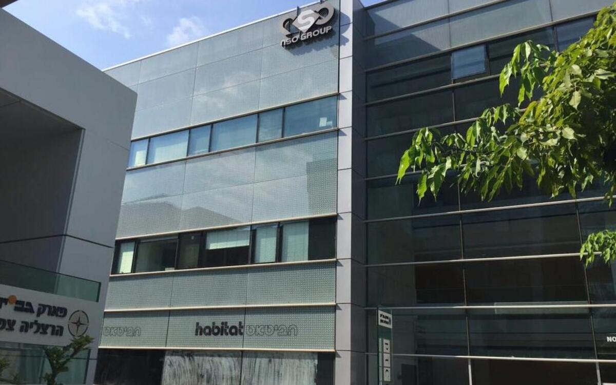 The logo of the Israeli NSO Group was still displayed Thursday, Aug. 25, 2016, on the building where it had offices until few months ago in Herzliya, Israel. An unsuccessful attempt to break into the iPhone of an Arab activist using hitherto-unknown espionage software triggered a global upgrade of Apple's mobile operating system.