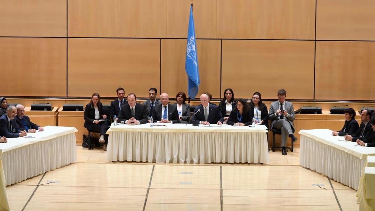 A new round of Syrian peace talks got under way in Geneva on Thursday. Shown here are Syrian chief negotiator Bashar al-Jaafari, left, U.N. Special Envoy for Syria Staffan de Mistura, center, and the Syrian opposition’s primary negotiator Nasr al Hariri, right.