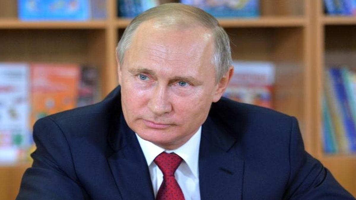 Russian President Vladimir Putin speaks prior to the beginning of the first lesson at a school at the Russian Pacific Ocean city of Vladivostok. On Thursday, Sept. 1, 2016, Putin told the Bloomberg news agency that Russia was not behind the hack of the Democratic National Committee in the United States.