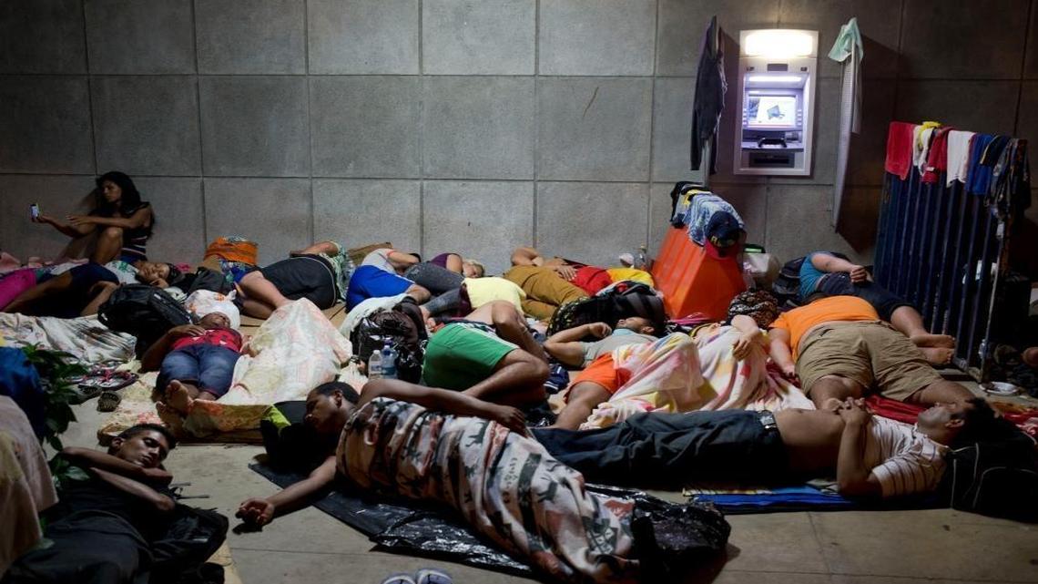 Cuban migrants were photographed in November outside the border control building in Penas Blancas, Costa Rica, after Nicaragua closed its borders to Cuban migrants. Nine Latin American governments on Monday charged that U.S. policy toward Cuban migrants has created a humanitarian crisis for the region.