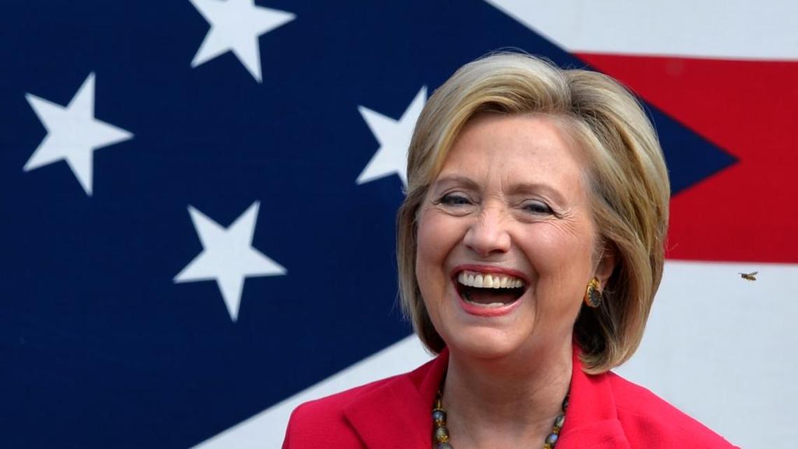 
Democratic presidential candidate Hillary Rodham Clinton laughs as she is introduced to a crowd on the campus of Case Western Reserve University during a 'Commit to Vote' grassroots organizing meeting Thursday, Aug. 27, 2015, in Cleveland. 
