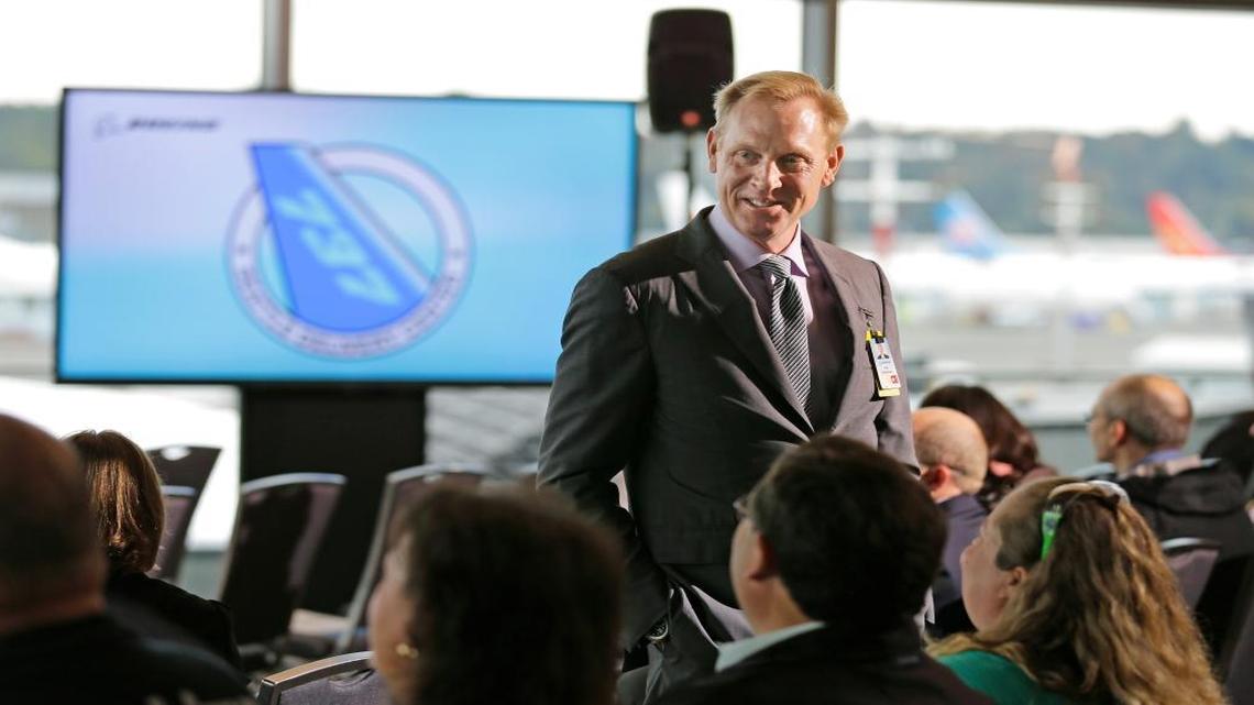 Pat Shanahan, senior vice president of Airplane Programs for Boeing Commercial Airplanes, greets guests at a re-opening ceremony for Boeing's newly expanded 737 delivery center, Monday, Oct. 19, 2015, at Boeing Field in Seattle.