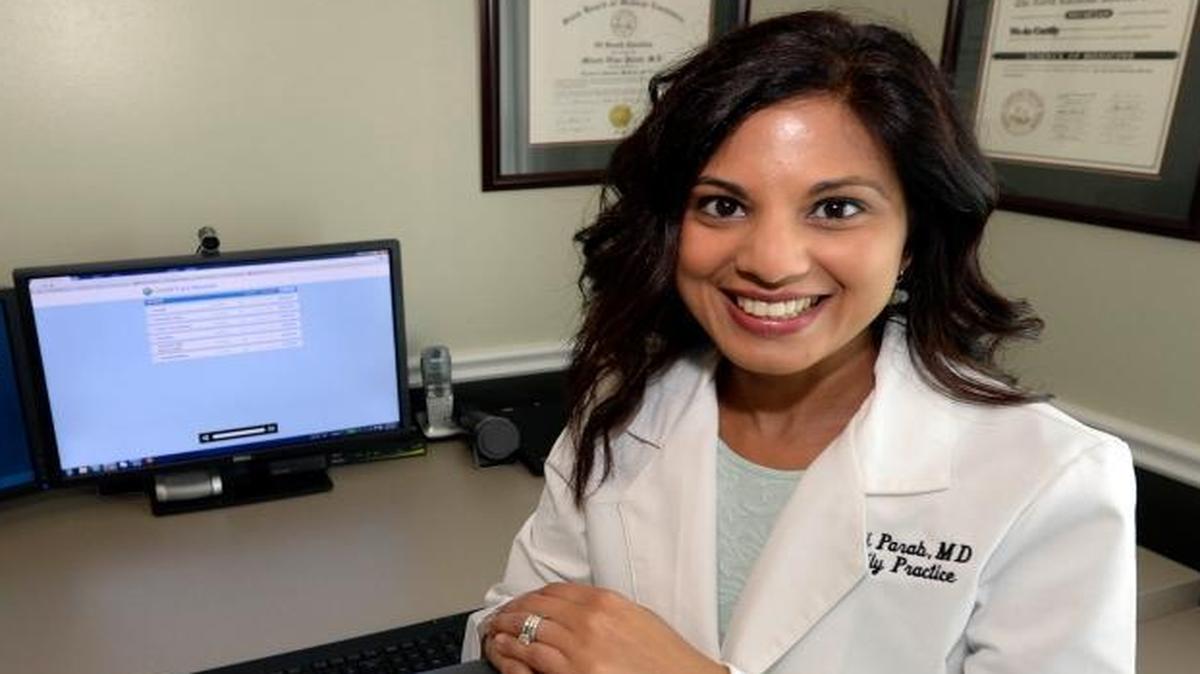 
Dr. Minoti Parab, a Telehealth Staff Physcian with Online Care Group, at her home office in Charlotte, N.C. on September 11, 2015. Dr. Parab practices family medicine, but sees no patients in person. All her "telemedicine" patient consultations are done via the internet.
