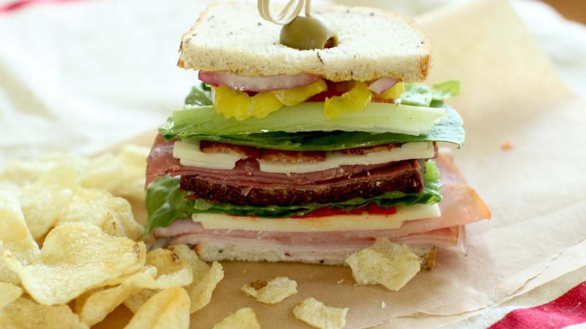 The World Health Organization says that processed meat, the staple of hearty sandwiches like the one pictured here, can cause cancer.