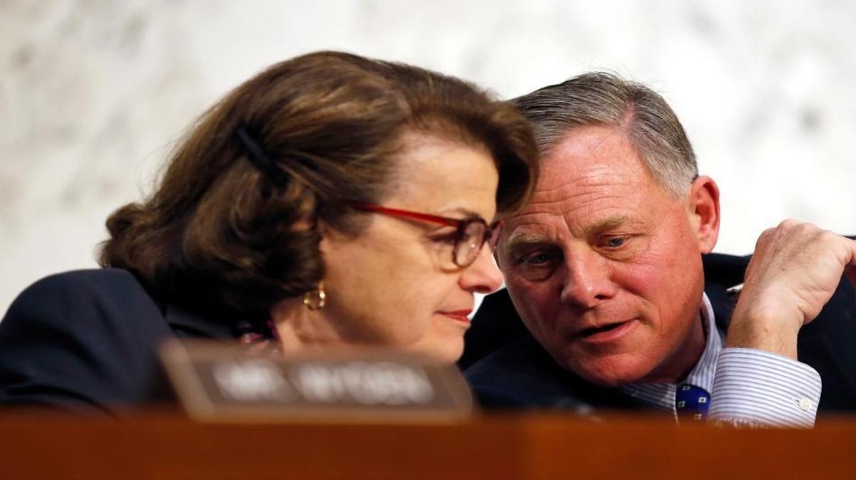Sen. Richard Burr, R-N.C., chairman of the Senate Intelligence Committee, talks with the panel’s vice chair, Sen. Dianne Feinstein, D-Calif., during a hearing on Capitol Hill in Washington, D.C., on Feb. 9, 2016.