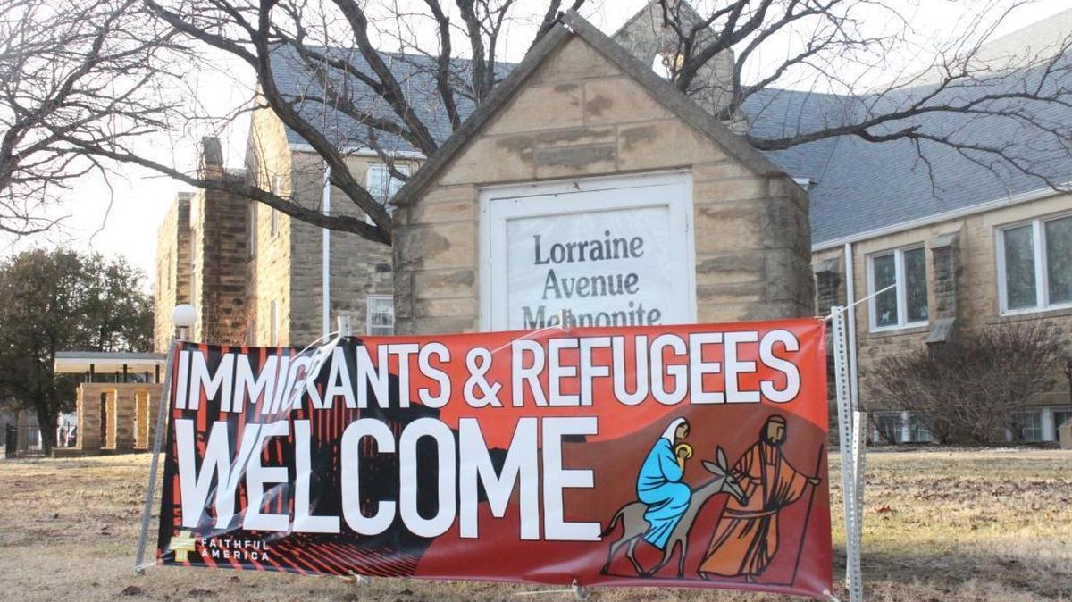 A sign outside Lorraine Avenue Mennonite Church in Wichita welcomes immigrants and refugees while depicting Mary, Joseph and Jesus as refugees fleeing to Egypt. Photo taken Jan. 31, 2017.