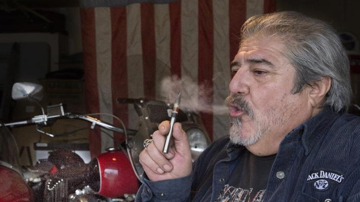 Daniel Porras, 61, vapes pure cannabinoid oil, the healing substance in marijuana, to manage his pain resulting from a 2005 motorcycle accident. Photo taken in Sultan, Wash., on Dec. 8, 2015.